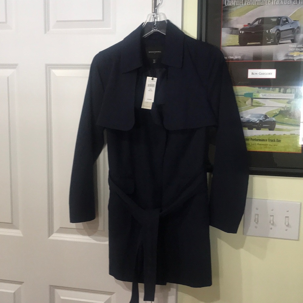 Navy lined trench jacket. Never worn, with tags.